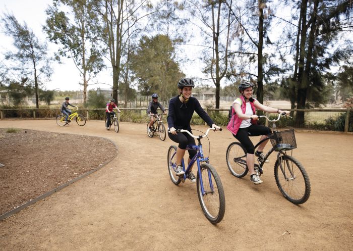 Small group enjoying a cycle around Taronga Western Plains Zoo, Dubbo