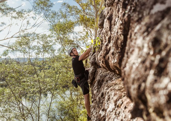 Man enjoying a rock climbing experience with Outdoor Raw in the Shoalhaven region of NSW