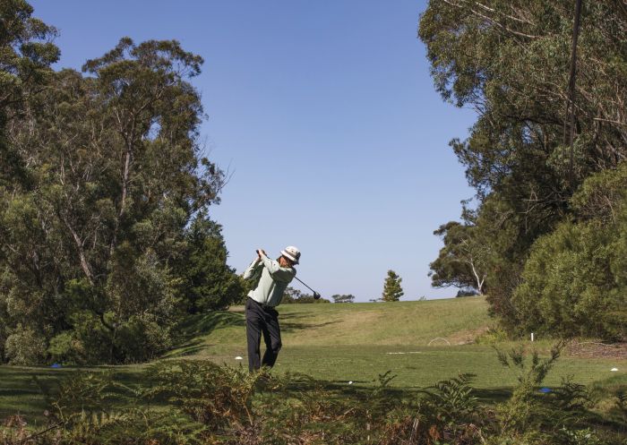 Man enjoying a round of golf at Leura Golf Club in the Blue Mountains