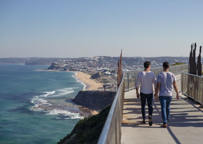 People enjoying the scenic walk along the Newcastle Memorial Walk, dedicated to WWI soldiers