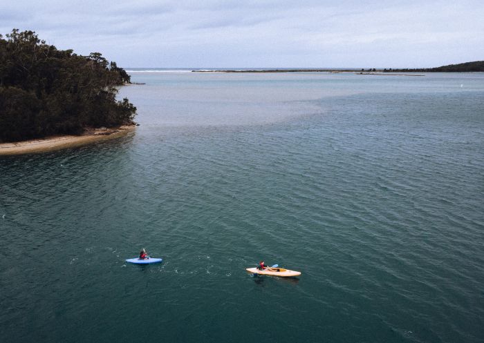 Couple kayaking along Tuross Lake, Tuross Head, Batemans Bay