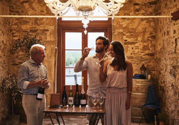 Couple enjoying a wine tasting experience at De Beaurepaire Wines, Rylstone