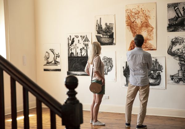 Couple enjoying a visit to the Broken Hill City Art Gallery in Broken Hill, Outback NSW