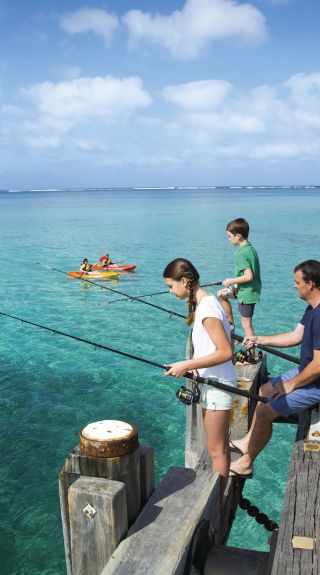 Family enjoying a day of fishing from the Lord Howe Island Wharf