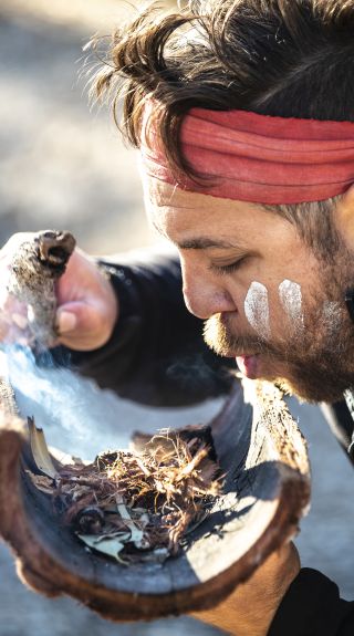 Smoking ceremony during a traditional welcome on a Ngaran Ngaran Culture Awareness tour - Narooma