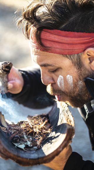 Smoking ceremony during a traditional welcome on a Ngaran Ngaran Culture Awareness tour - Narooma