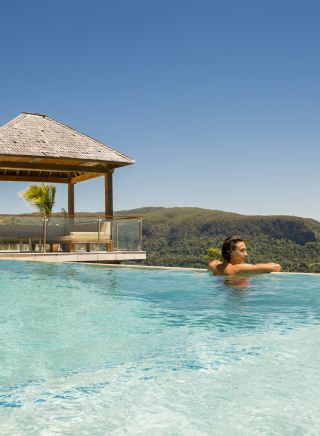 Guest enjoying the new of the hinterlands of Byron Bay from Koonyum Range Retreat, Mullumbimby