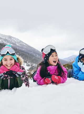 Children enjoying a fun day in the snow at Thredbo in the Snowy Mountains