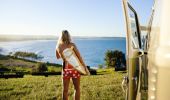 Surfer heading to the beach, Lennox Head, Northern Rivers