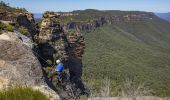 Woman abseiling at Cahills Lookout, Katoomba in the Blue Mountains