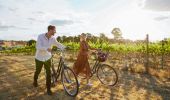 Couple enjoying a bike ride around the Clonakilla Wines vineyard in Murrumbateman, Yass Area