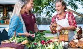 Couple shopping for fresh produce at the SAGE Farmers Market in Moruya, Batemans Bay, South Coast