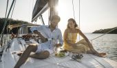 Couple enjoying a sailing experience in Fame Cove, Port Stephens