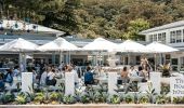 People enjoying food and drink at Boathouse Patonga, Gosford Area 