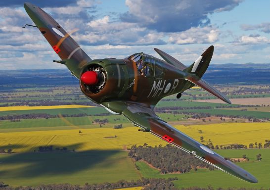 A vintage CA-13 Boomerang flying above Temora, Riverina, NSW